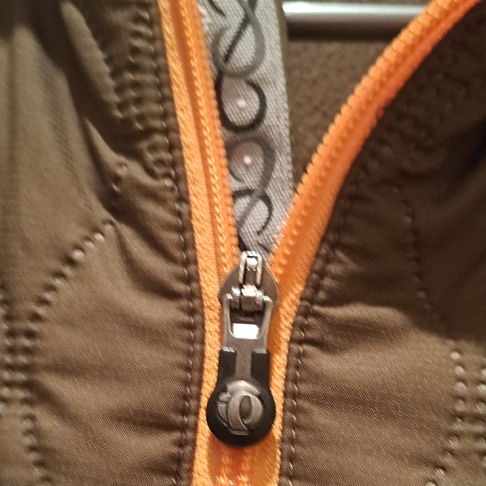 079 - Pearl Izumi Quilted And Fleece Jacket with Orange Trim And Lovely Detail. - Picture 3 of 7
